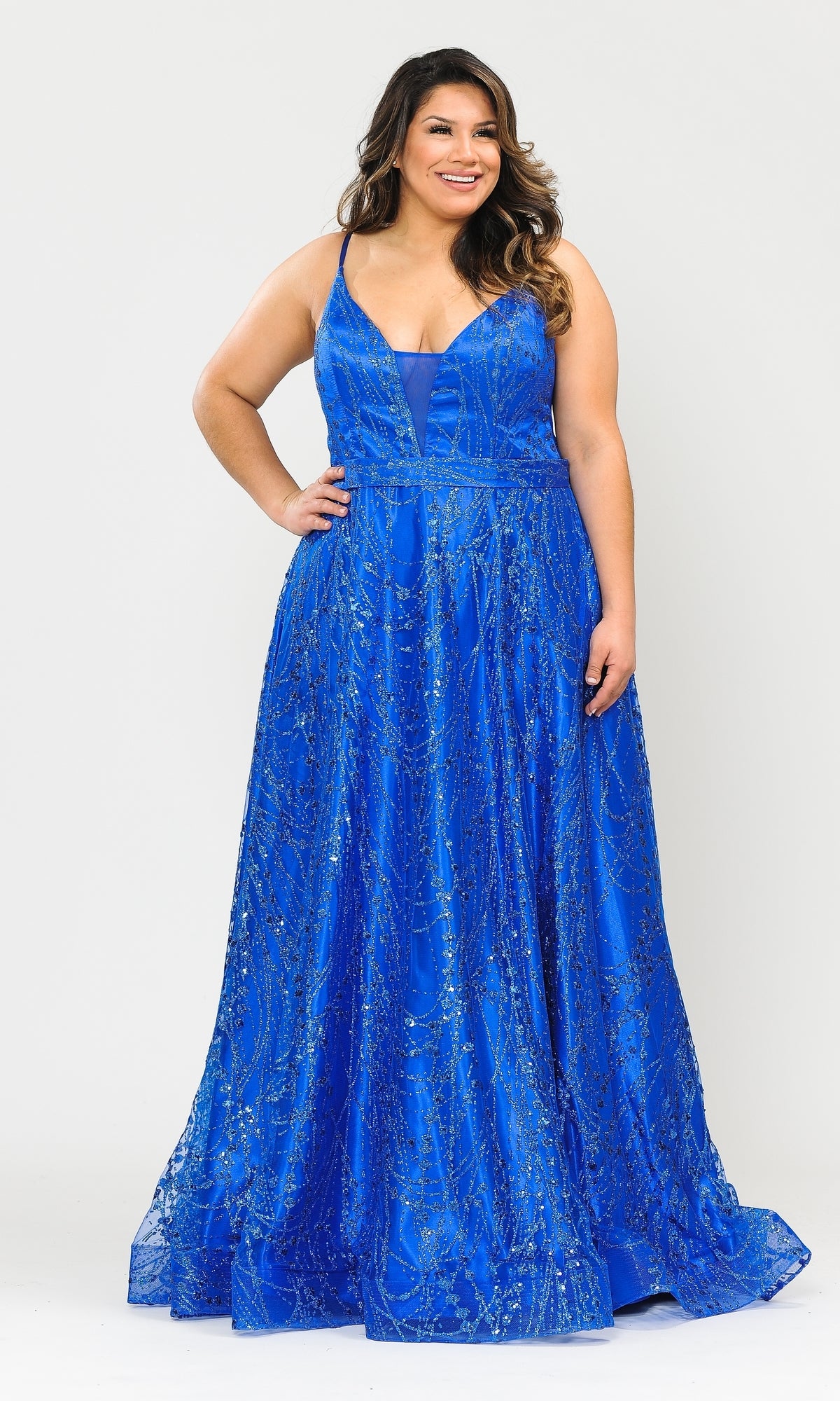 A woman poses against a white background wearing the Plus-Size Long Glitter-Print Prom Dress W1004 in royal, featuring a floor-length silhouette, sleeveless design, glitter print accents, and a lace-up back.